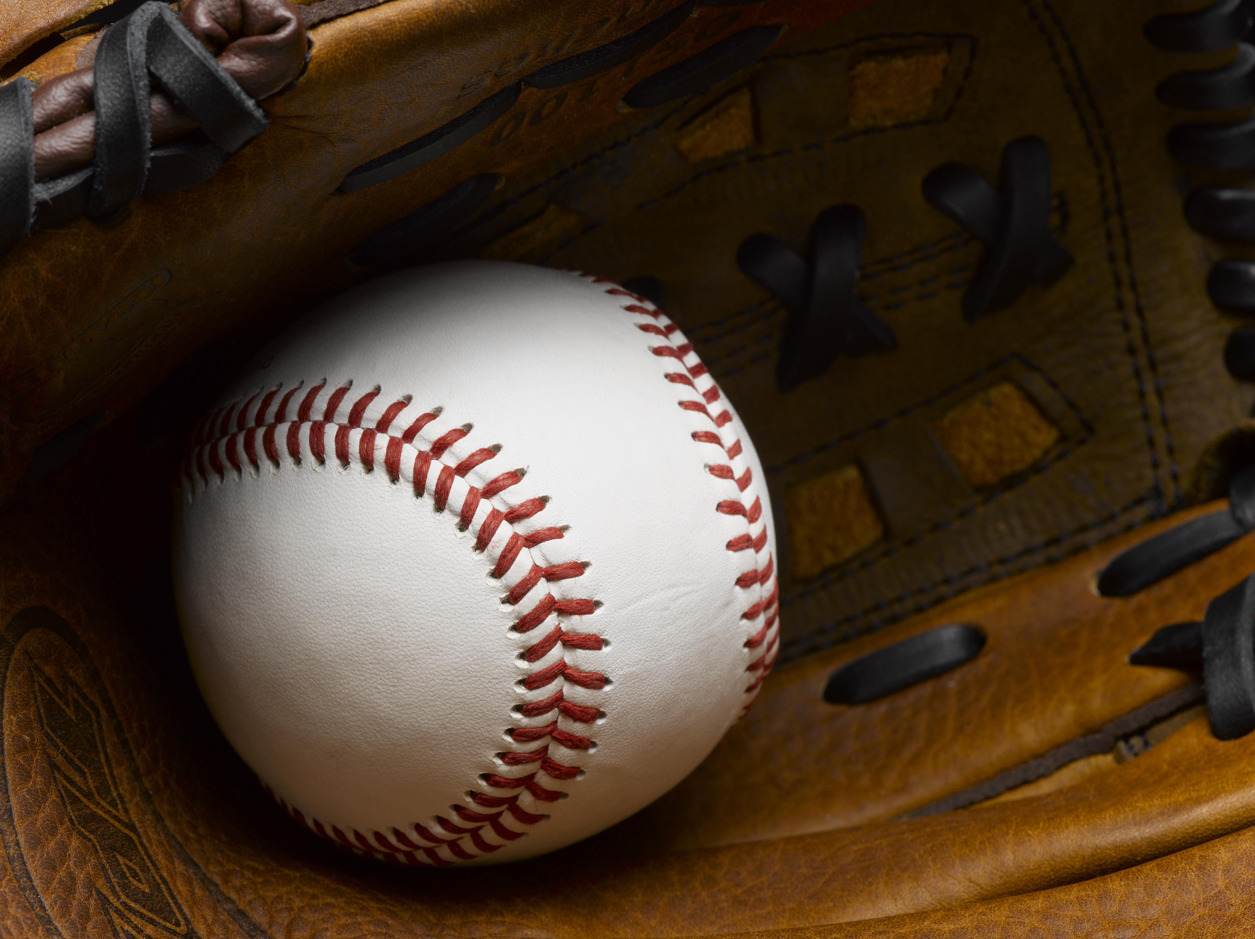 Baseball in glove close-up