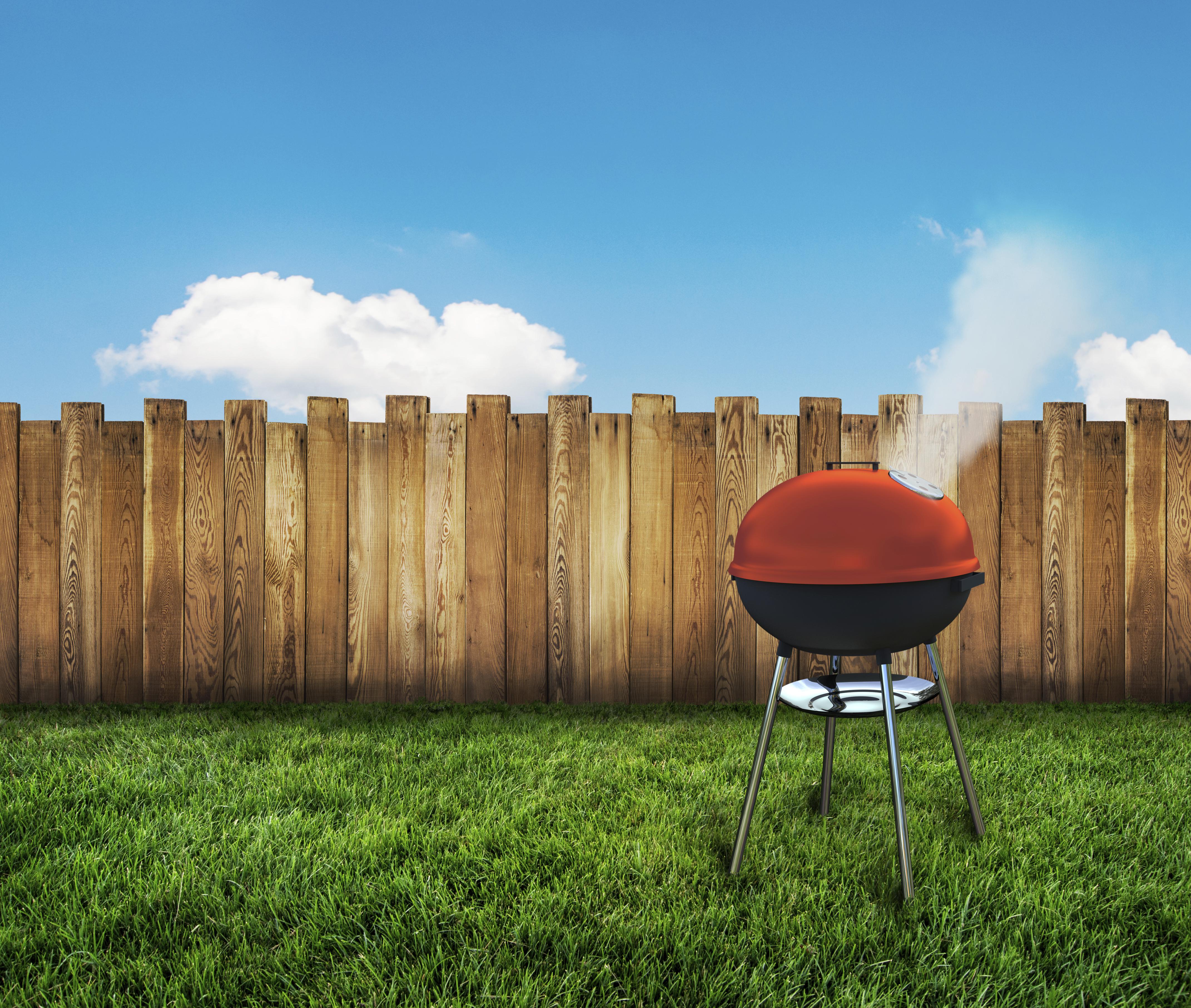 kettle barbecue grill on backyard