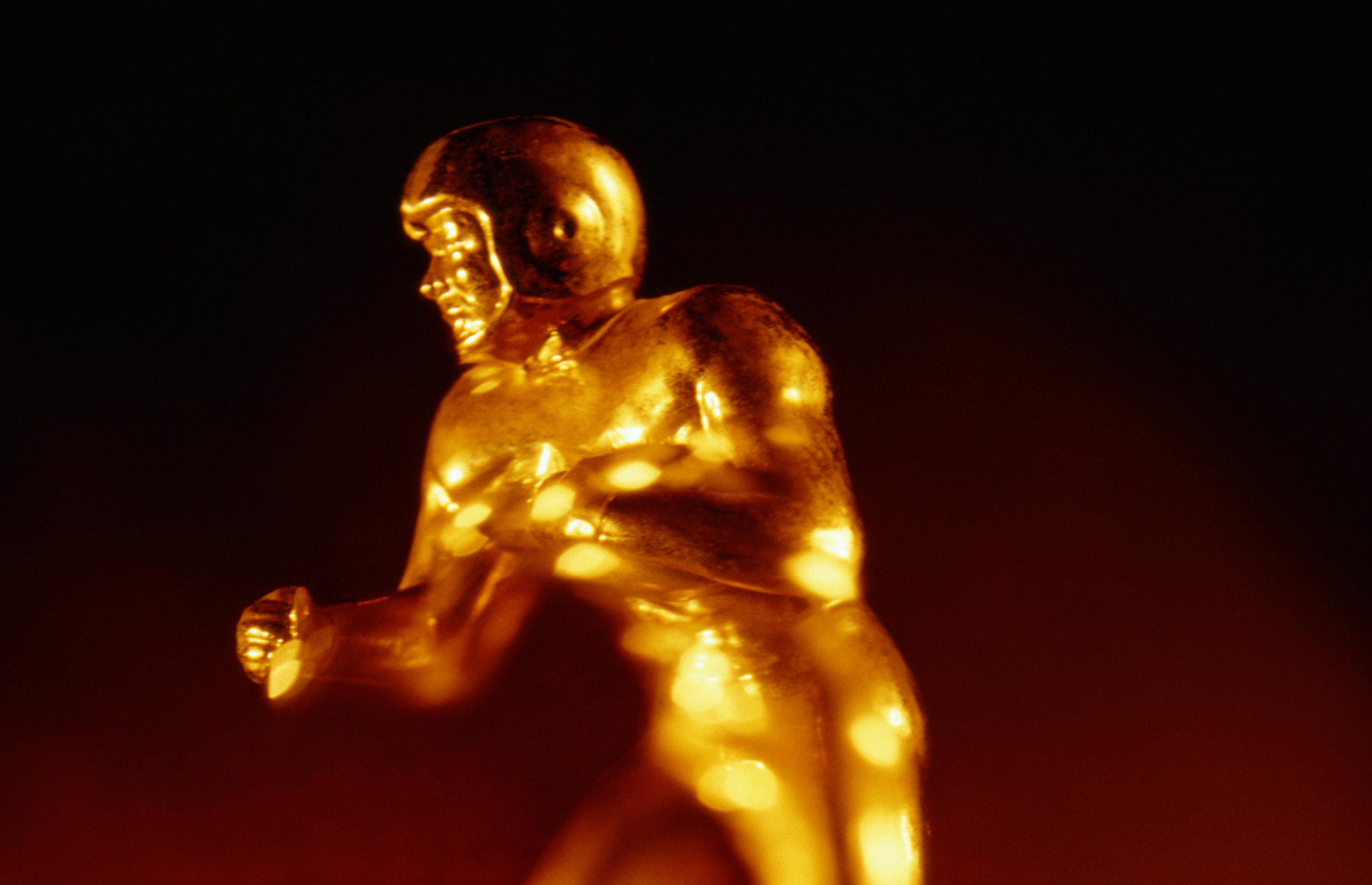 Close-Up of Golden Football Trophy