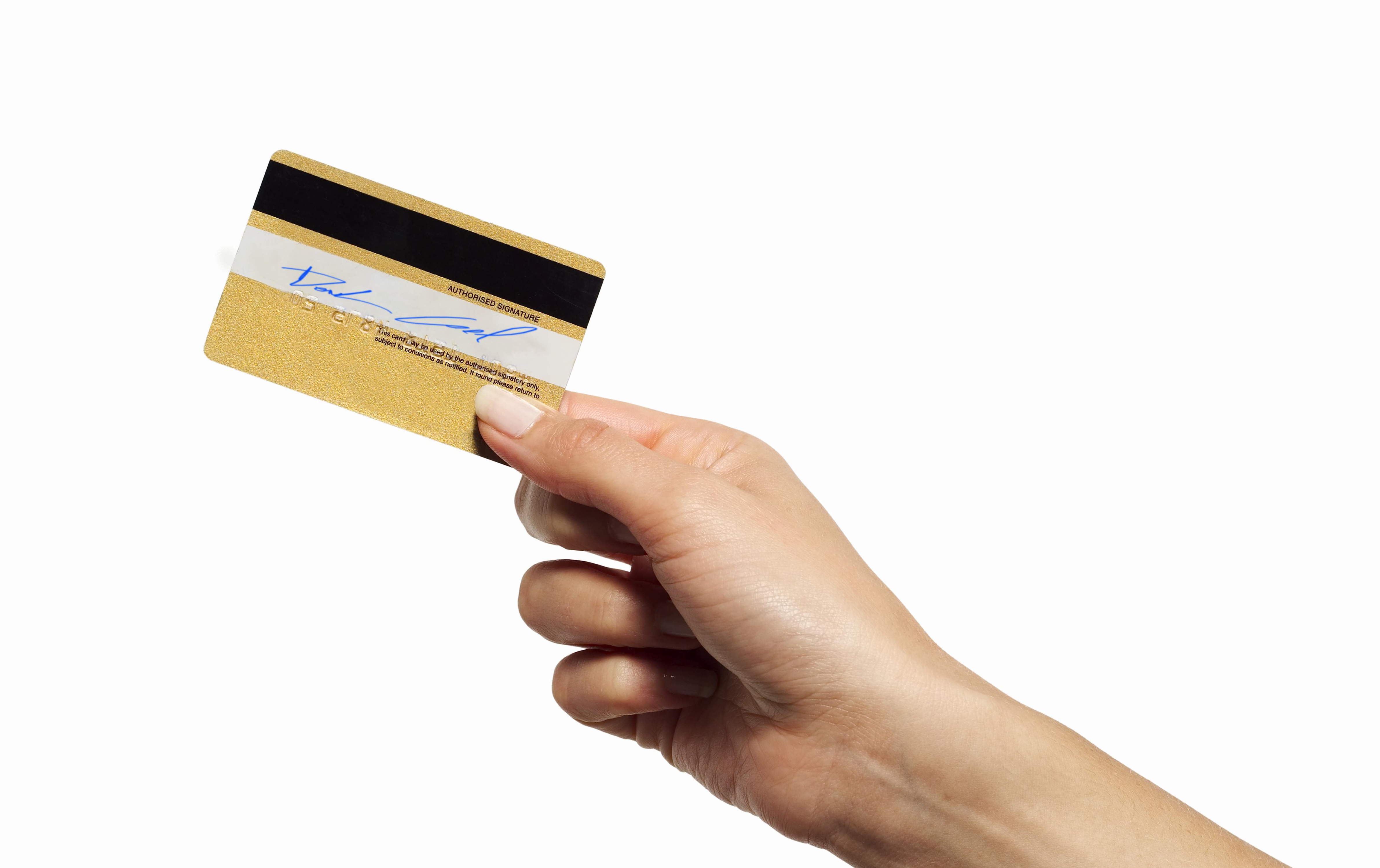 Close-up of woman's hand holding credit card