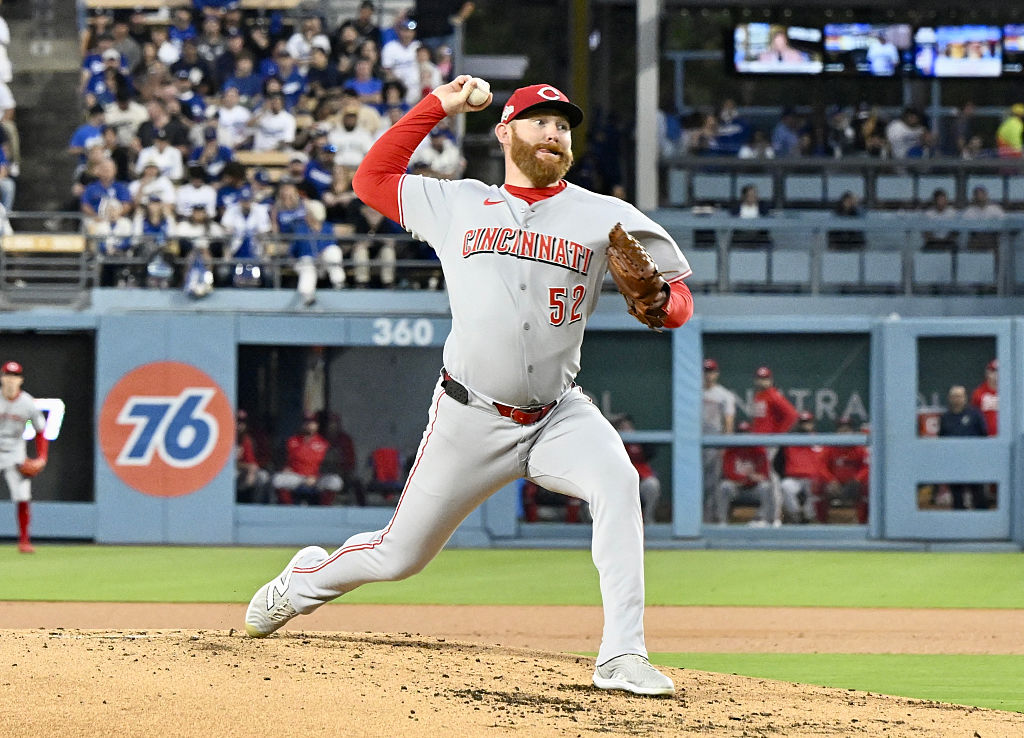 Los Angeles Dodgers defeated the Cincinnati Reds 8-4 to win game 2 of a wild card series baseball game and advance to the NLDS.